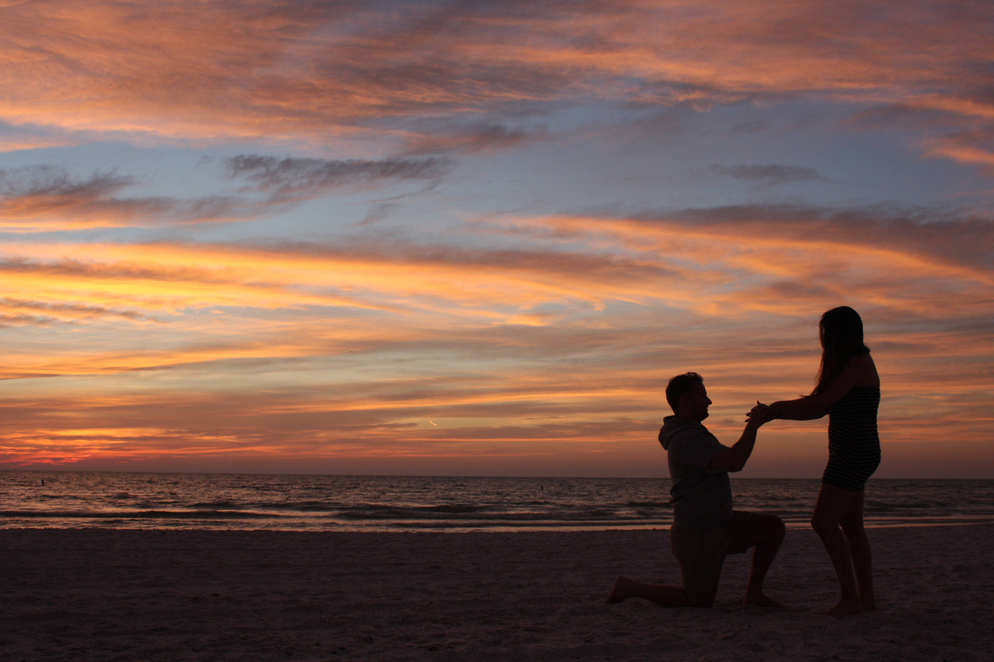 David Proposes to Megan at the Beach with the Perfect Engagement Ring from Henne Jewelers