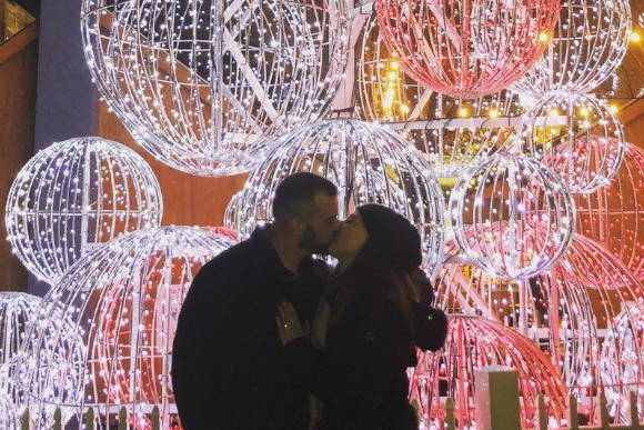 Henne Engagement Ring Couple Paul and Megan Share a Kiss After Paul Proposed at PPG