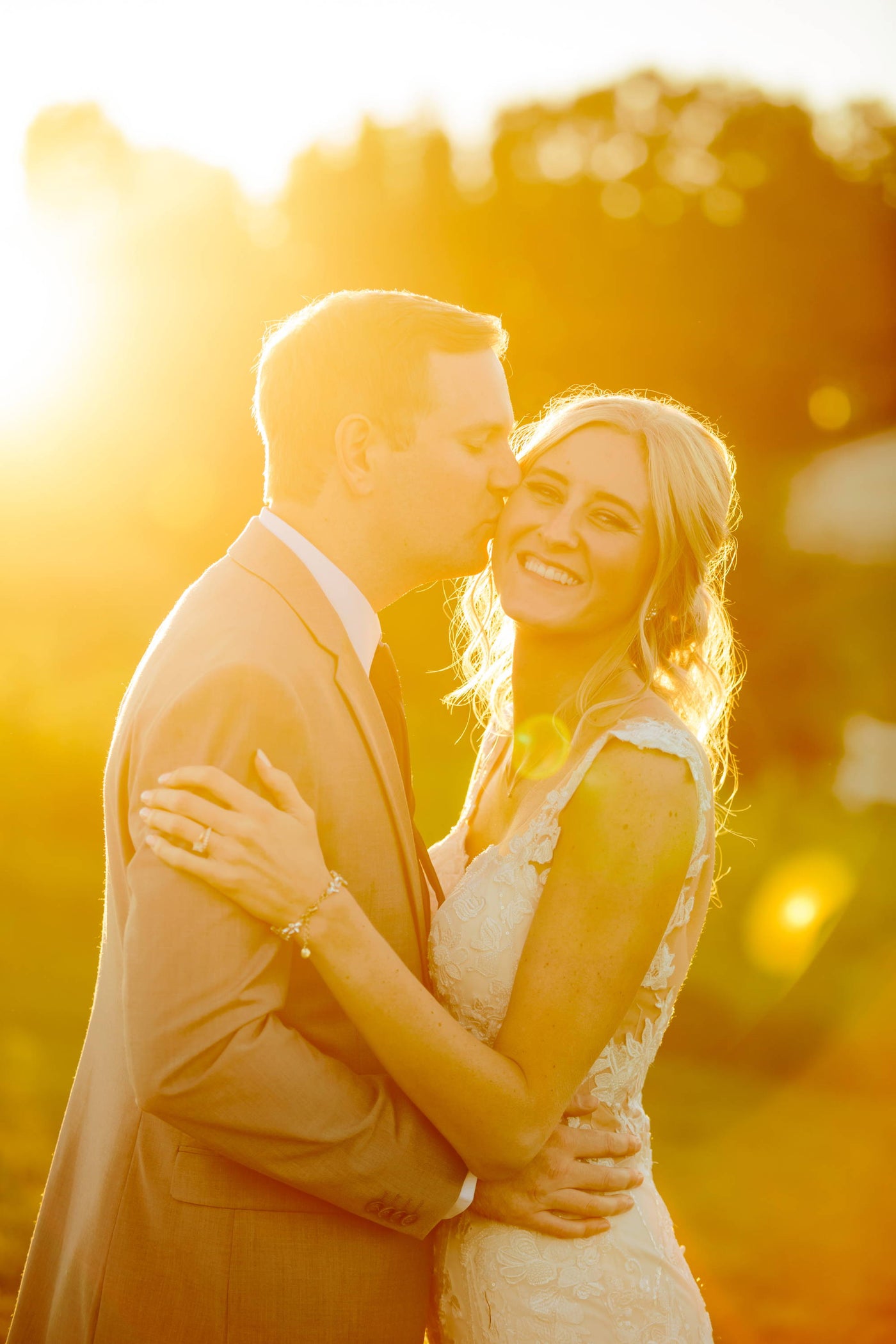 Henne Engagement Ring Couple Scott & Sarah Share a Kiss Under the Sunset