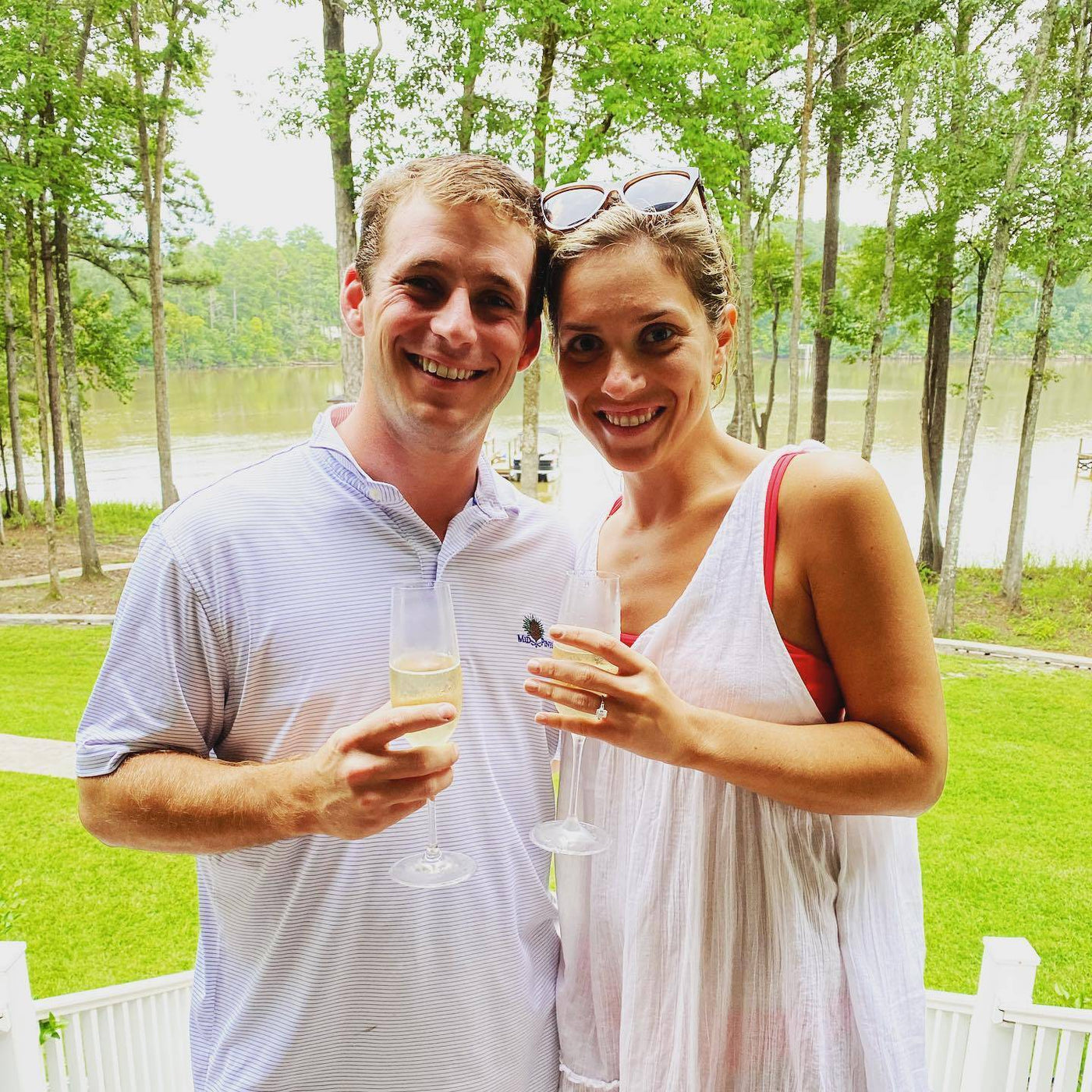 Henne Engagement Ring Couple Brooks and Claire Celebrating Their Engagement with Champagne