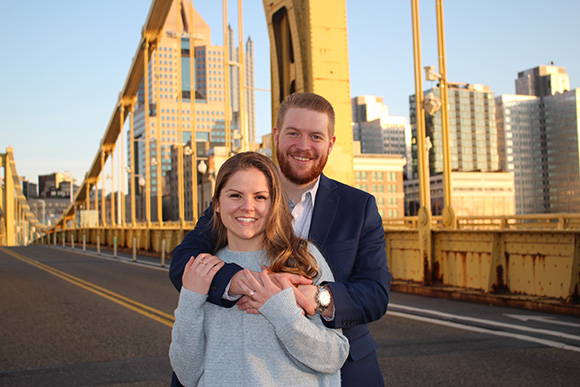 Henne Engagement Ring Couple Calvin & Madi on  Bridge Overlooking the City