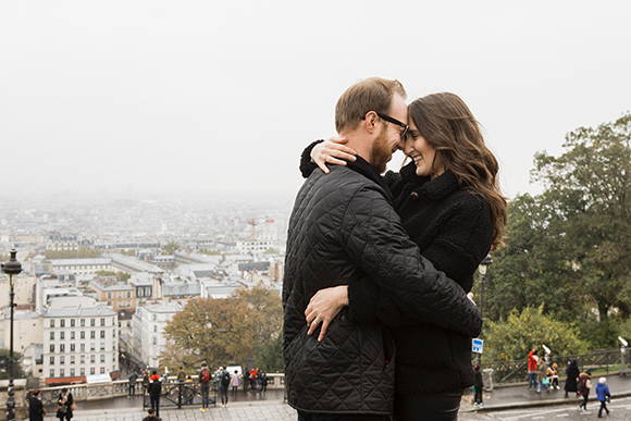 Henne Engagement Ring Couple Derek & Elle Share a Hug Overlooking the City