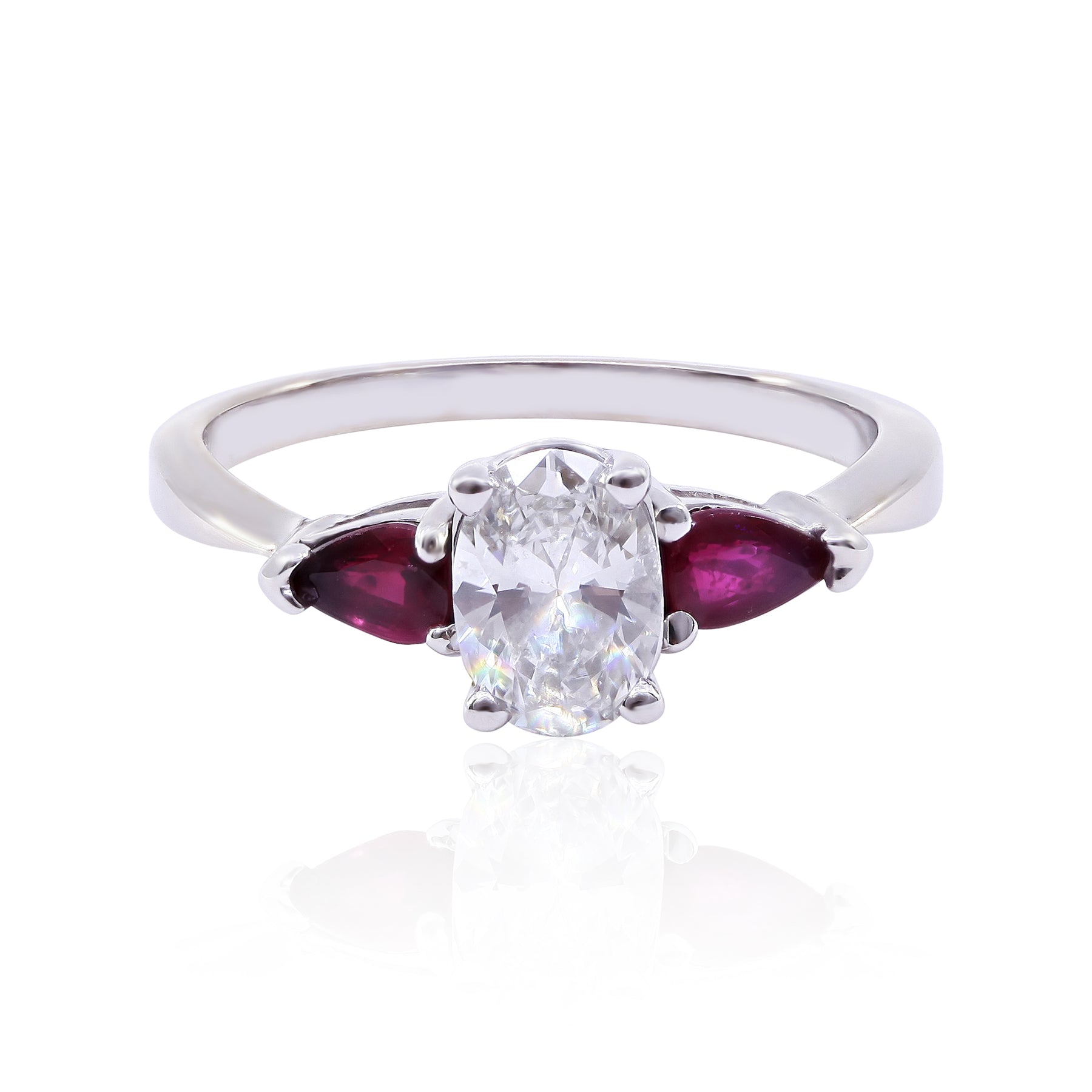 ESTATE 14K WHITE GOLD OVAL DIAMOND AND PEAR-SHAPE RUBY THREE-STONE RING