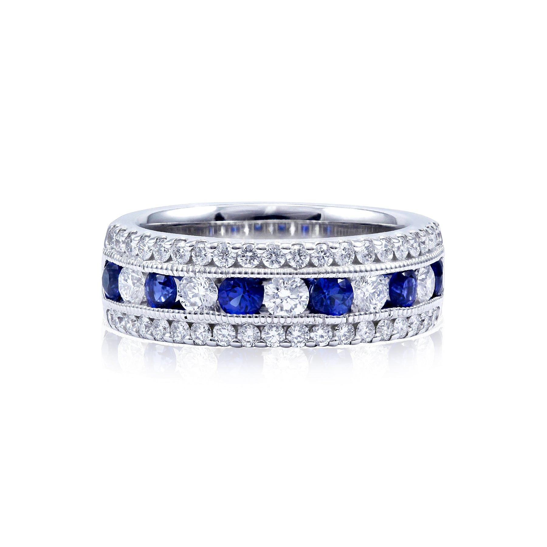 14K WHITE GOLD BAND WITH ALTERNATING MILGRAIN CHANNEL SET DIAMONDS AND SAPPHIRES AND DIAMOND SIDE ROWS