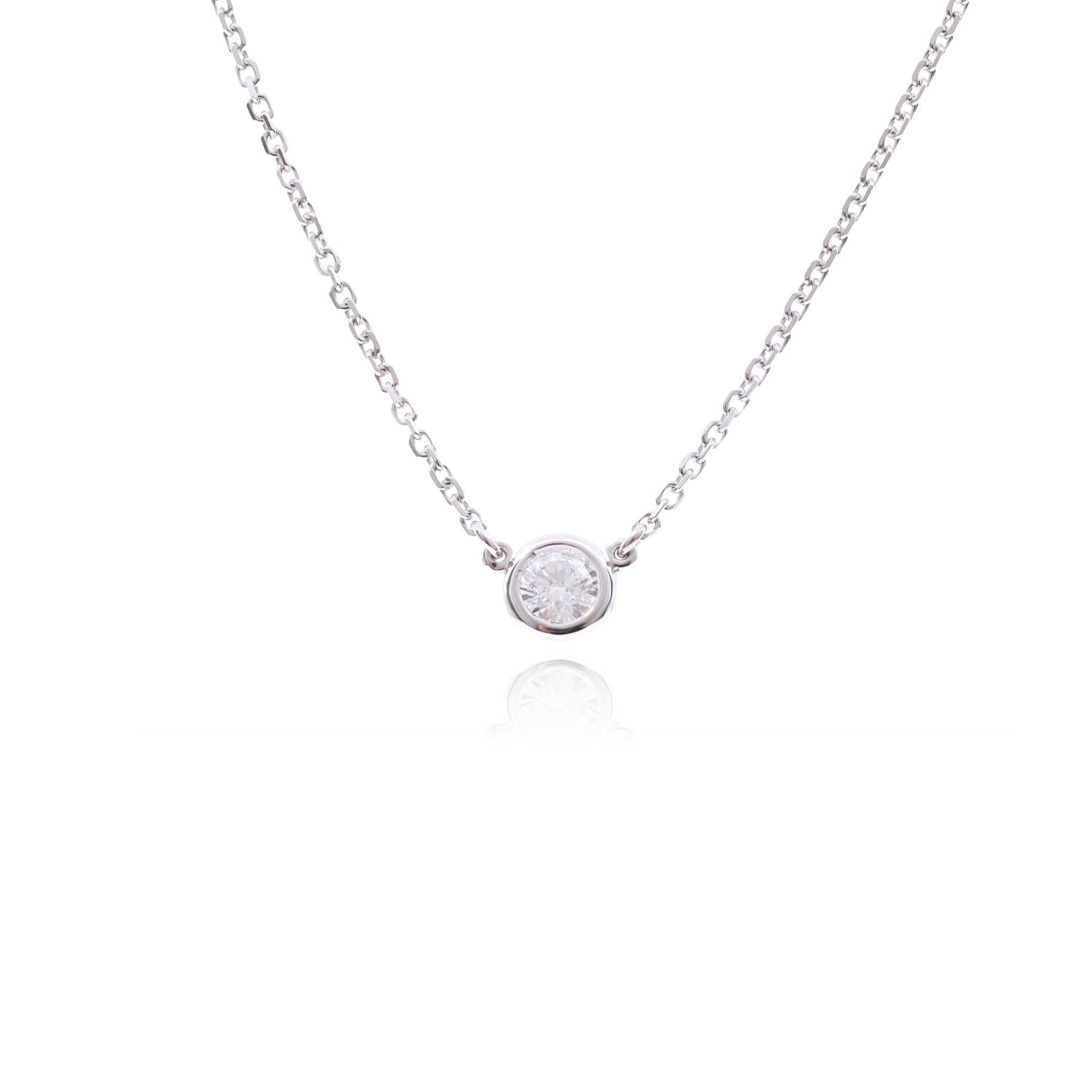 14K WHITE GOLD BEZEL-SET SOLITAIRE DIAMOND NECKLACE - 0.15CT